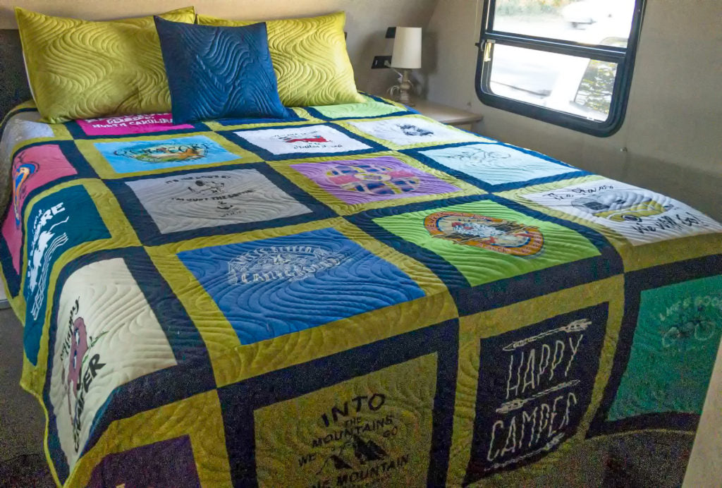 Handcrafted boxed t‑shirt quilt showing wavy quilt pattern
