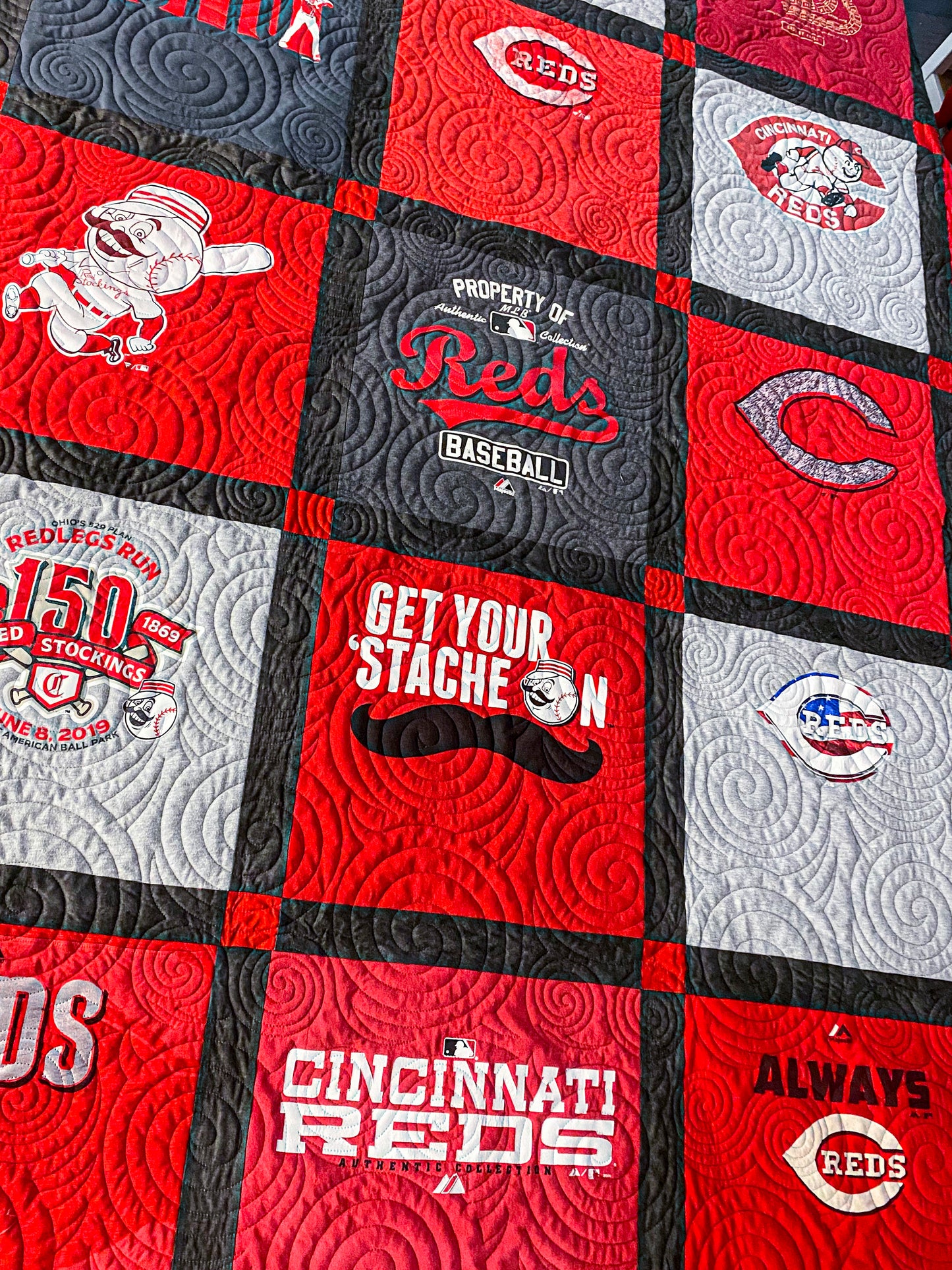 Close-up of cotton sashing and corner blocks on t‑shirt quilt