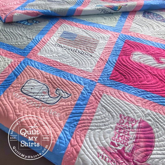 Boxed t‑shirt quilt 30 blocks with pink and coastal blue  sashing